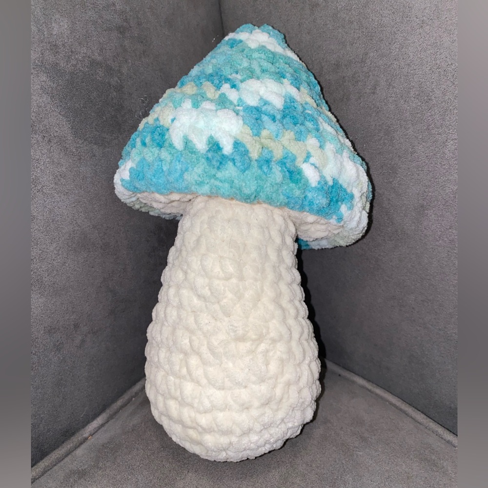 Mini Plush Mush in a teal and blue tie-dye style yarn